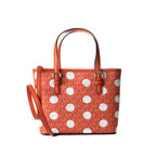 Michael Kors orange canvas handbag