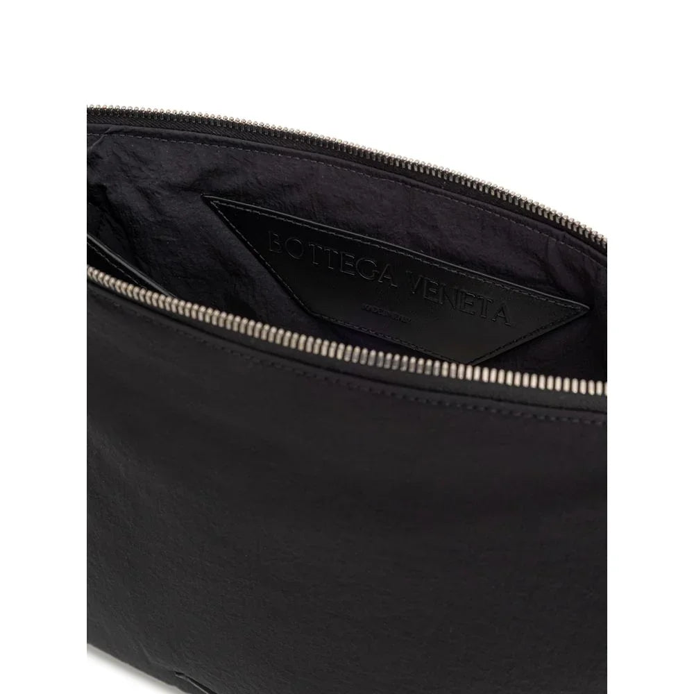 Bottega Veneta clutch in zwart nylon met leren handgreep en logo - MARANOS